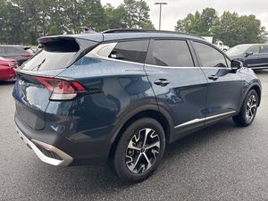 Clean Blue 2024 Ki_a Sportage Hybrid EX AWD Utilisé avec les sièges en cuir Ensemble premium Système de navigation Bluetooth Toit ouvrant chauffant - Product Image 3