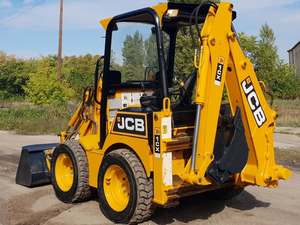 รถตักล้อยาง JCB 1CX สำหรับงานหนัก พร้อมโครงสร้างที่ทนทาน ความสามารถในการขุดที่ทรงพลัง และการควบคุมที่ราบรื่น สำหรับขาย - Product Image 1