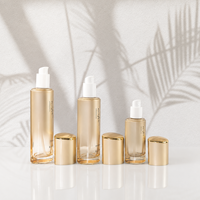 Ensemble de flacons cosmétiques en verre doré Mingsheng avec couvercle à vis, pot à crème, pompe à sérum, flacon à lotion, flacon à toner 30g 50g 50ml 100ml 120ml