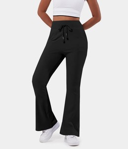 <b>Women's</b> Mid Waist Elastic Waist Flared <b>Waterproof</b> Pants Drawstring Pocket Fashion Streetwear <b>Leggings</b> for Winter Running Outfits - Product Image 4