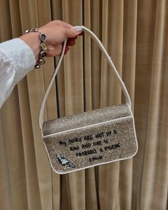 Sac à main brodé traditionnel avec sangle de ceinture réglable - Product Image 1