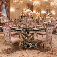 Table ronde de luxe en acier inoxydable argenté pour hôtel, idéale pour les événements et les fêtes