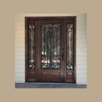 Porte en fer forgé sur mesure avec des motifs en spirale artistiques et une finition en poudre durable pour une longévité accrue