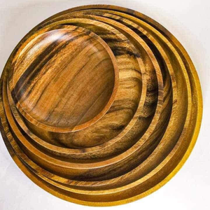 Venta al por mayor de platos de madera negra sólida de postre hechos a mano personalizados de madera de acacia platos de cargador de cena redondos de glowin fashion - Product Image 1