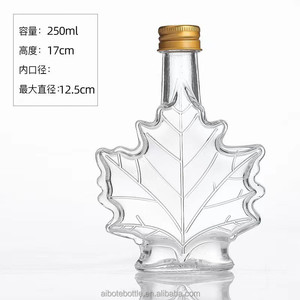 Bouteilles en verre uniques en forme de feuille d'<span class=keywords><strong>érable</strong></span> 50ml 100ml 250ml pour <span class=keywords><strong>l</strong></span>'emballage des boissons <span class=keywords><strong>Rhum</strong></span> foncé Whisky Miel Eau Bouchon <span class=keywords><strong>à</strong></span> vis - Product Image 3