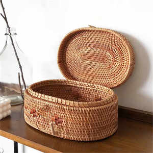 Cesta de almacenamiento tejida de ratán ovalada con tapa Caja de regalo natural personalizada para el hogar Cocina Precio barato Cesta de picnic - Product Image 1