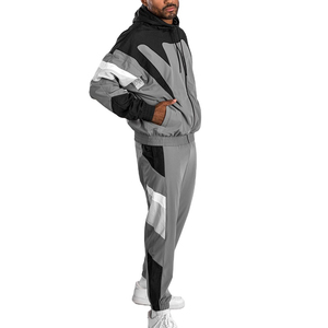 Conjuntos de Jogger de poliéster personalizados para hombre, chándal cortavientos de dos piezas transpirable con chaqueta de nailon con cremallera Patchwork - Product Image 2