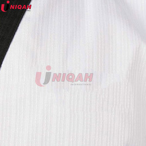 Uniforme de Taekwondo unisexe adulte de haute qualité, impression de logo personnalisée, tissu en coton et polyester pour l'entraînement de MMA et de kickboxing - Product Image 2