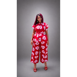 Set Due Pezzi in Cotone Rosso Ankara con Top Corto e Pantaloni con Disegni Triangolari Bianchi - Product Image 1