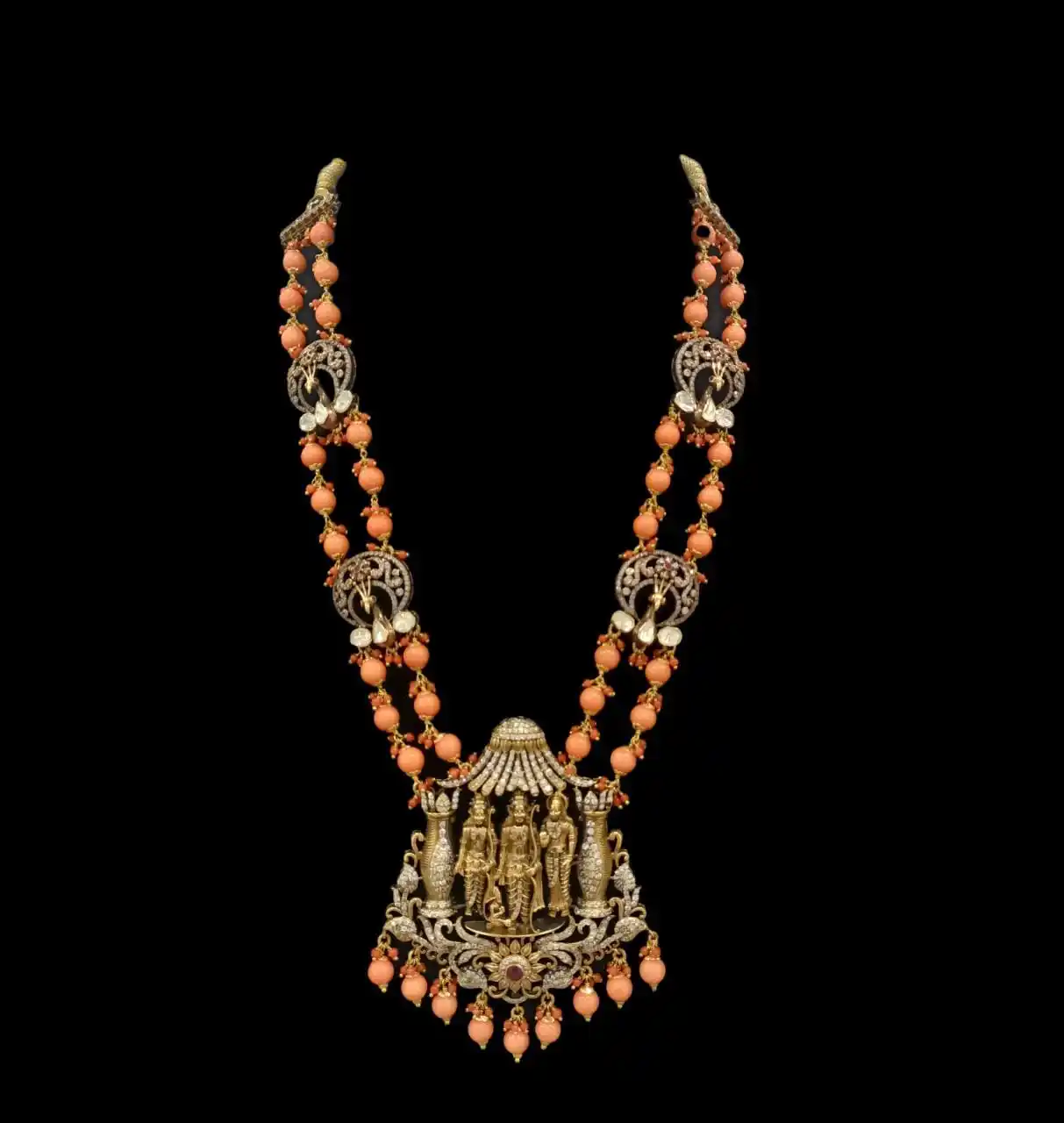 Antique peacock with Indian Goddess pendant adorned with diamonds, coral and emerald beads necklace with nakshi kundan pendant