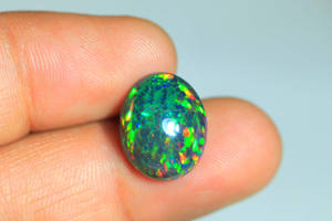 โอปอลทรงหลังเบี้ยสีดำโอปอลทรงวงรีสีดำสำหรับทำเครื่องประดับอัญมณีโอปอลสีดำขัดเงาเรียบ8-10Carat ขนาดใหญ่ - Product Image 4