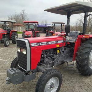 Tracteur agricole Massey Ferguson 240S de qualité supérieure, 40 CV, couleur rouge, avec cabine et moteur visible - Product Image 1