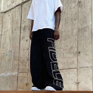 Nouveau pantalon baggy en nylon 2026 avec ceinture élastique, ceinture réglable, fermeture éclair et bouton, poches, jambe large, couleur noire - Product Image 4