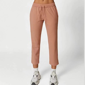 Pantalon de sport décontracté pour femmes pantalon de survêtement de couleur unie poches à taille élastique pantalon droit respirant pour la course de printemps - Product Image 1
