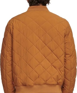 Veste matelassée imperméable en polyester de couleur unie, logo personnalisé OEM en gros, veste matelassée respirante - Product Image 2