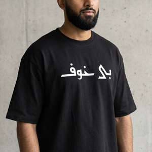 เสื้อเจอร์ซีย์ทรงโอเวอร์ไซส์แบบไหล่ตก ผ้าฝ้าย 100% น้ำหนัก 240 กรัม พิมพ์ลายซิลค์สกรีน ลวดลายแบบกดอัด - Product Image 1