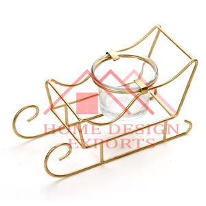 Bougeoir T Light de Noël au design de chariot à neige en métal doré - Product Image 1