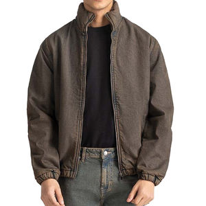 Veste matelassée en denim isolée en polyester pour les activités de plein air avec un design pliable et un col haut pour la protection contre le vent et le froid - Product Image 1