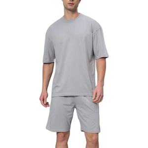 ชุดกีฬาสำหรับผู้ชายเสื้อสองชิ้นและกางเกงขาสั้นผ้าคอตตอนระบายอากาศได้ดีสไตล์ลำลอง - Product Image 1