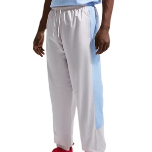 Pantalon de jogging imperméable en toile premium pour homme, résistant à l'eau, léger, pour l'entraînement, le sport et le style urbain - Product Image 2