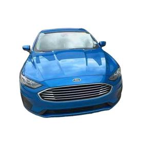 Fusion Hybrid SE 2022 d'occasion, conduite à gauche, boîte manuelle/automatique, berline, sièges en cuir, caméra de recul, essence/électrique - Product Image 1