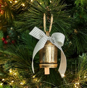 Ornate engraved brass <b>cow</b> <b>bells</b> for Hindu worship rituals old temple aesthetics or handmade ethnic home furnishings - Product Image 1