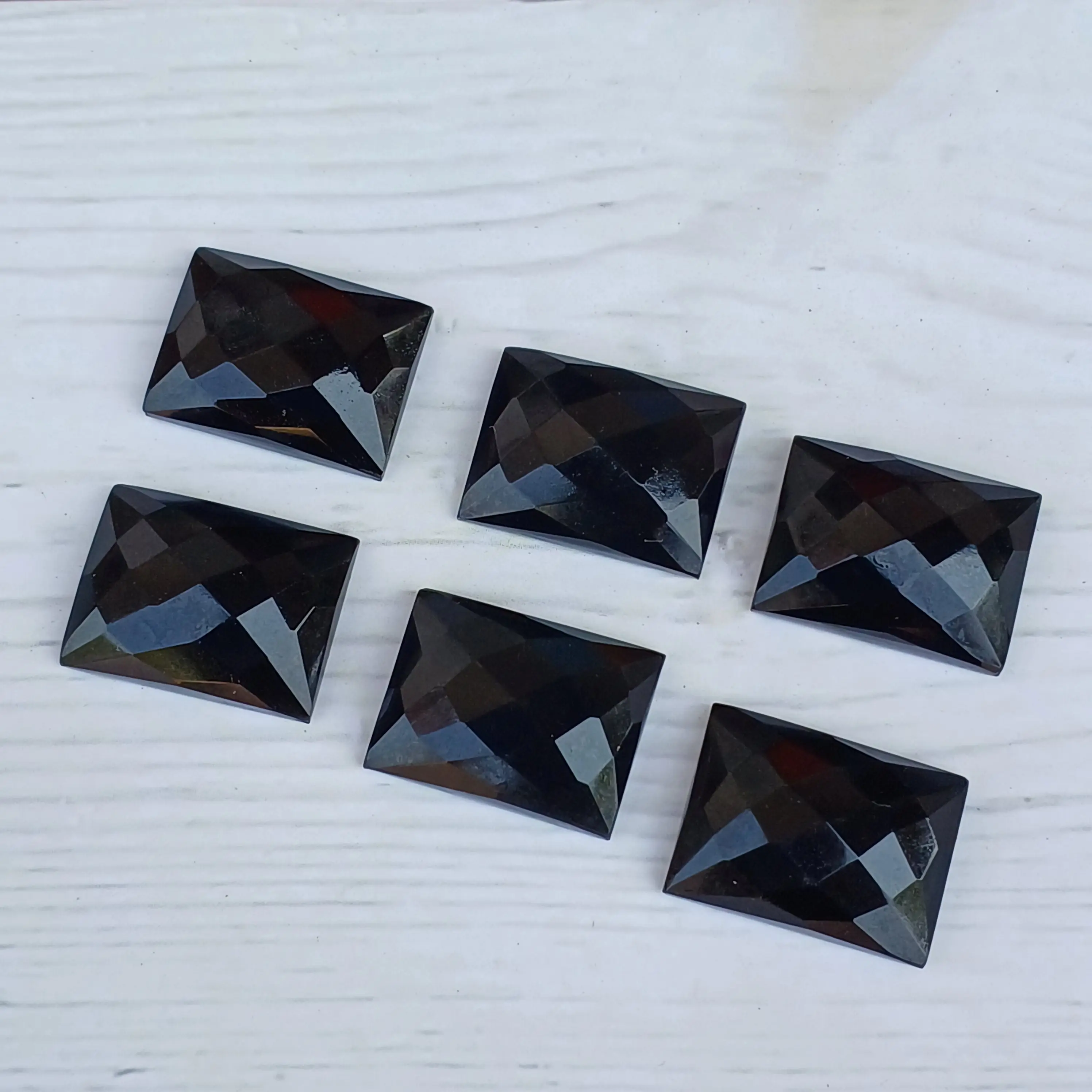 Piedra preciosa suelta calibrada en forma de rectángulo de corte a cuadros de ónix negro Natural para joyería proveedor a granel