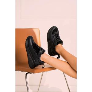 Sneaker con suola imbottita in velluto nero