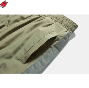 Pantalones de chándal de nailon personalizados 100% poliéster pantalones de nailon de pierna ancha logotipo bordado 3D pantalones de chándal de nailon holgados para hombres - Product Image 3