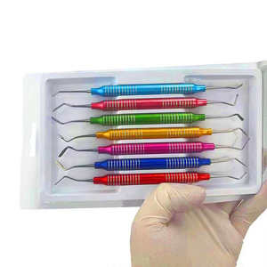 Juego de 7 piezas de odontología, instrumento de relleno de resina compuesta colorida, espátula de mango grueso para cirugía de restauración Dental - Product Image 1