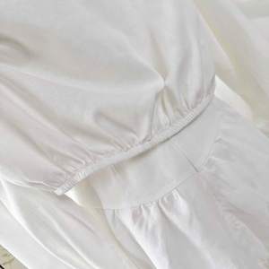 Conjunto Elegante OEM de Blusa de Manga Larga con Botones y Minifalda a Capas - Product Image 6