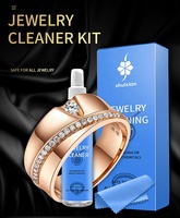 Le kit de nettoyage de bijoux anti-ternissement en argent et or personnalisable en usine comprend un liquide propre et un chiffon de polissage pour bijoux