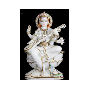 Mármol blanco Saraswati Mata con acabado pulido y de la más alta calidad, sentada sobre una flor de loto, para uso en el hogar y templos. - Product Image 1