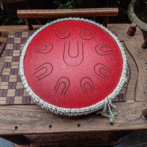 Suministro al por mayor de tambor de lengua de acero rojo perfecto para sesiones de meditación o uso en estudios de yoga disponible a buen precio - Product Image 1