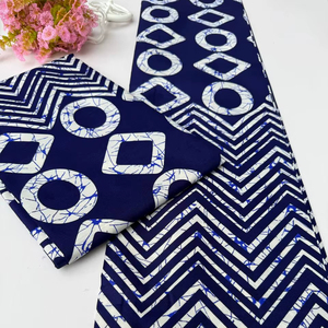 Tanzania African Wax Print and Ankara Block Print Cambric Cotton Fabric with Bright Multicolor Designs forTraditional and Modern - Product Image 1