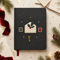Journal de Noël personnalisé LABON, couverture rigide noire, enveloppe brodée, clé de houx, timbres-poste, étoiles dorées, pages lignées