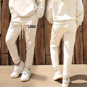 Custom 2025 Mid Waist Jogger Pants Solid Tapered Gym Track Pantalones de chándal Oversize Unisex Pantalones - Product Image 1