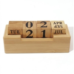 This handcrafted wooden desktop <b>calendar</b> is a reusable and eco-friendly office accessory - Product Image 2
