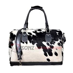 ผมขาวดำบนกระเป๋าหนังวัว - Product Image 1