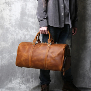 Bolsa de lona de cuero personalizada Bolsa de viaje y gimnasio plegable deportiva con cinturón de hombro de moda Bolsas de cuero genuino - Product Image 1