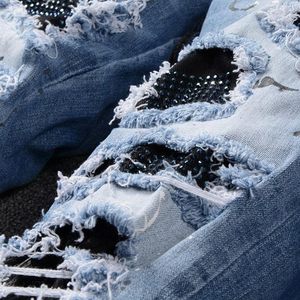 กางเกงยีนส์ของผู้ชายกางเกงยีนส์ทรงสกินนี่เข้ารูปปักลายขาดๆสีน้ำเงิน - Product Image 3