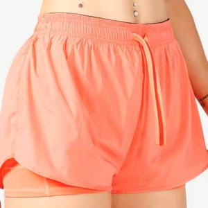 Tela brillante 95% poliéster 5% Elastano Regular Hot Coral Glaze 2 en 1 pantalones cortos de mujer cintura enrollada con agarre de silicona transpirable - Product Image 5