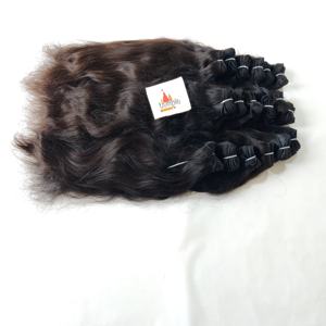 Venta al por mayor Virgen India Crudo Mujeres Procesado Cutícula Alineada Ninguno Color natural Negro mujeres Extensiones de cabello humano de onda profunda - Product Image 2