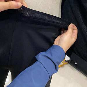 Vente en gros Survêtement surdimensionné Pantalon de survêtement ample en nylon Ensemble jogging Survêtement en nylon coupe-vent réfléchissant pour hommes - Product Image 6