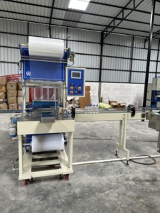 Machine d'emballage rétractable automatique à ligne unique pour bouteilles d'eau en PET | Équipement d'emballage à grande vitesse - Product Image 2