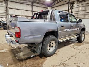 Toyota Hilux d'occasion 1998, automatique, conduite à gauche, pneus turbo R18, porte-bagages en alliage d'aluminium, sièges en tissu, essence - Product Image 3