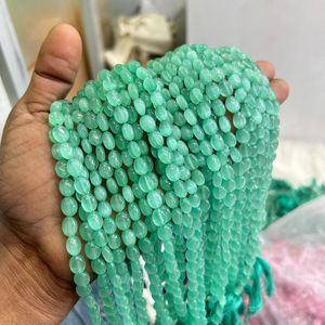 Monalisa สีเขียวอ่อนลูกปัดหลวมพลอยธรรมดาทรงรีแบนเรียบมีคุณสมบัติในการรักษา - Product Image 4