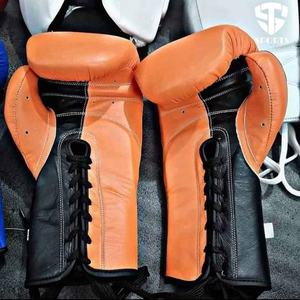Nouveaux gants d'entraînement professionnels de boxe et de kickboxing en cuir 12oz et 16oz Caractéristiques de poinçonnage imperméables pour les compétitions - Product Image 2