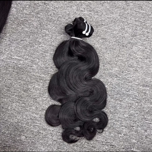 Vente en gros Extension de cheveux humains ondulés naturels à trame Extension de cheveux de couleur naturelle Cheveux humains vietnamiens à double tirage Un seul donneur - Product Image 5