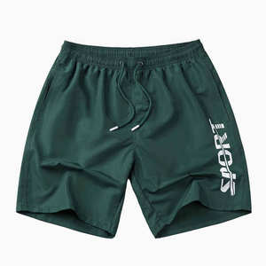 Shorts de sport pour hommes en polyester, vente chaude, impression de logo personnalisée, taille mi-haute, motif uni, élastique, shorts de plage, de course à pied et de natation - Product Image 1